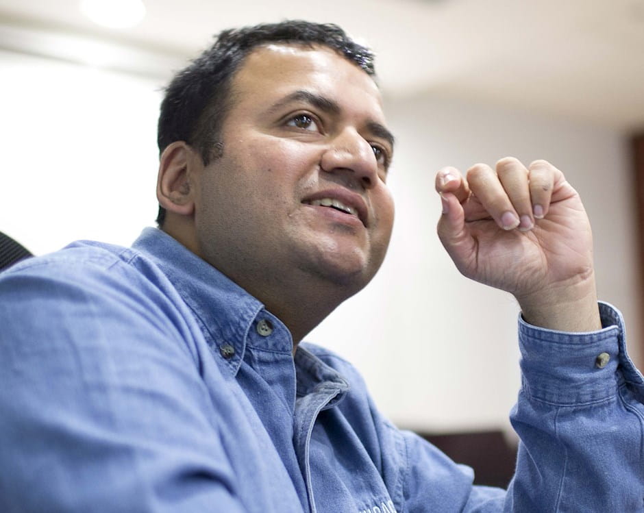 Dhiraj Rajaram in a classroom